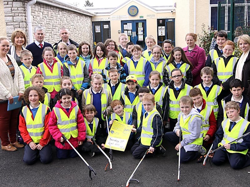 KS2 pupils at Termoncanice Primary pictured raedy to set off on a Spring Clean in the Backburn Path area of Limavady as the school works towards its Eco Schools Green Flag, Grainne Bradley the schools Eco School Co-ordinator, is pictured along with vice principal Mrs Mary Harron, and John McCarron of Limavady borough council as they set off for the litter pick. INLV1813-010KDR