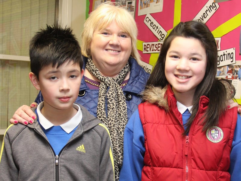 Grandmother Christine Doherty pictured with her grandchildren Sam (P5) and Summer (P7) at Termoncanice PS Grandparents To School Day on Wednesday. 0402JM21