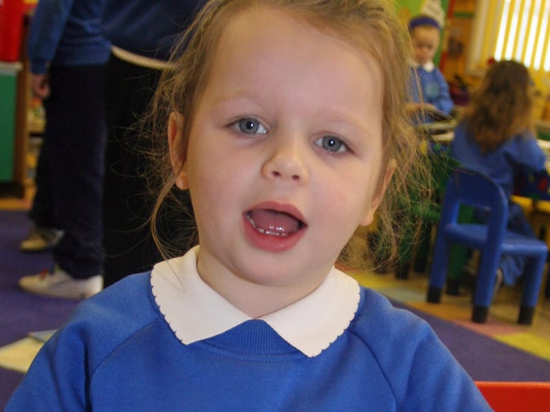 NO, ITS A PUPPY!. . .Young Taylor Keadle points out 'Fluff' The Dog, during yesterday's 'Book Buddies' event at Termoncanice PS, Limavady. 2802JM20