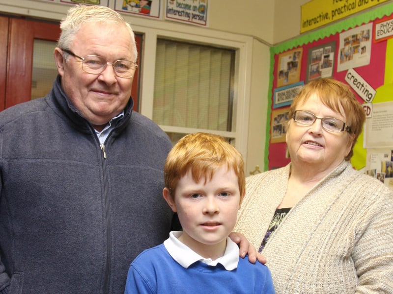 Grandparents Edward and Jane Ann McLaughlin pictured with their grandson Eunan (05) at Termoncanice PS Grandparents To School Day on Wednesday. 0402JM25