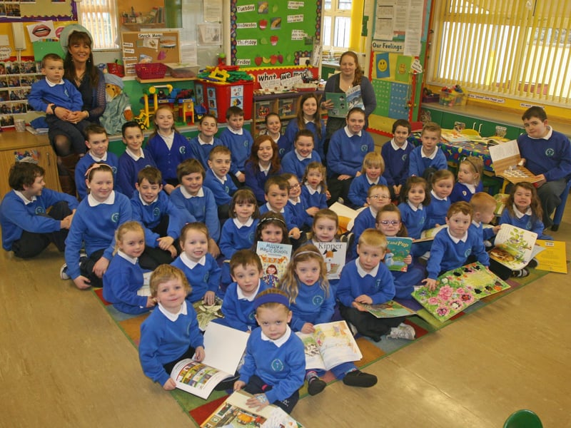 TERMONCANICE PS BOOK BUDDIES!. . . .Teachers Ms. Diamond (nursery) and Ms. Toner (P6) pictured with nursery and P6 students at yesterday's 'Book Buddies' event at the Limavady school. 2802JM18