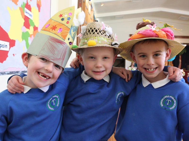Bonnet boys Killian McGuinness, Ruairi Holmes and Jude Kirkpatrick pose for a photo during Easter celebrations at Termoncanice PS on Wednesday afternoon. 2803JM93