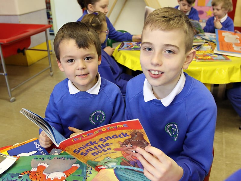 Zack from the nursery unit and P pupil Daniel Lane at Termoncanice Primary school working in a Book Buddies initiative between the two classes. INLV0913-047KDR