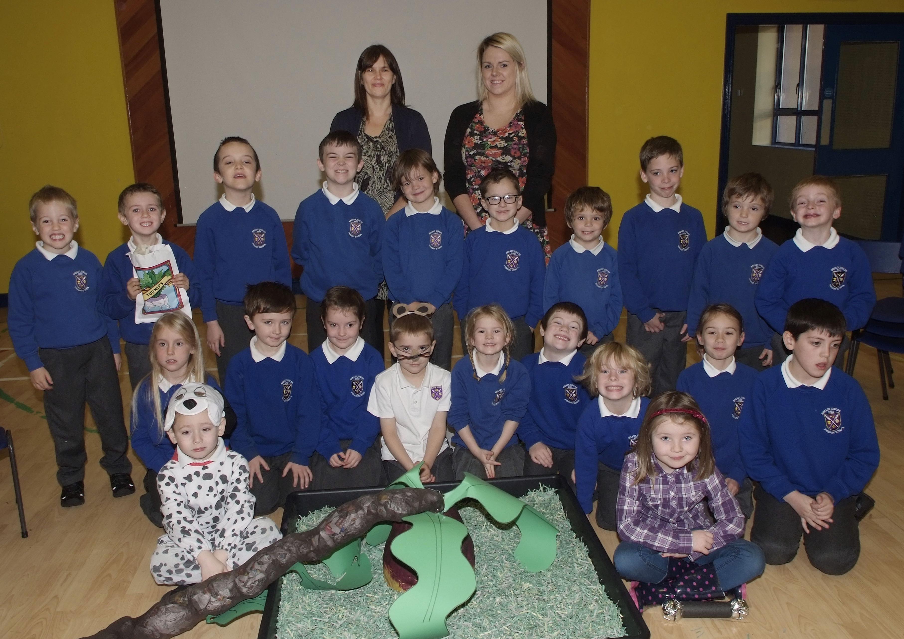 Some of the P2, 3 & 4 pupils who took part in the recent Harvest Assembly at Bready Jubilee Primary School. Included are Luanne McElwee, Principal, and Yolanda Scobie, teacher. INLS4413-103KM