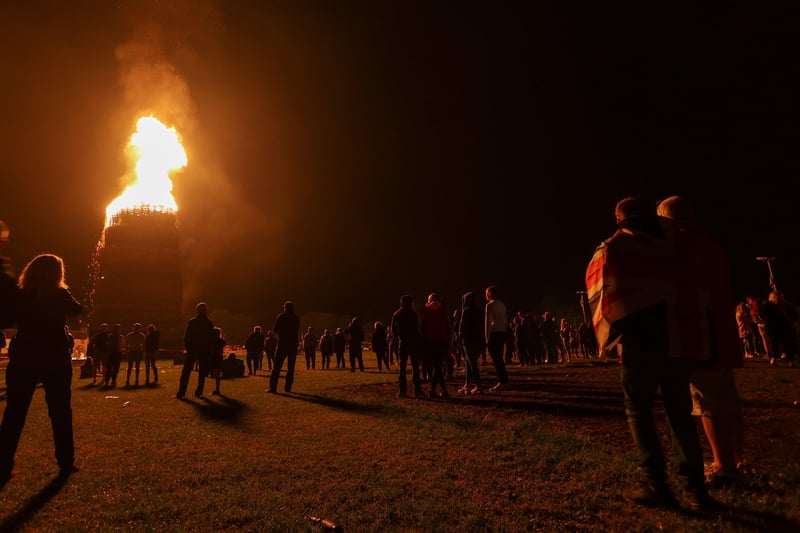 Crowds gather for the burning of the massive Craigyhill bonfire in Larne.
Picture: Philip Magowan / PressEye