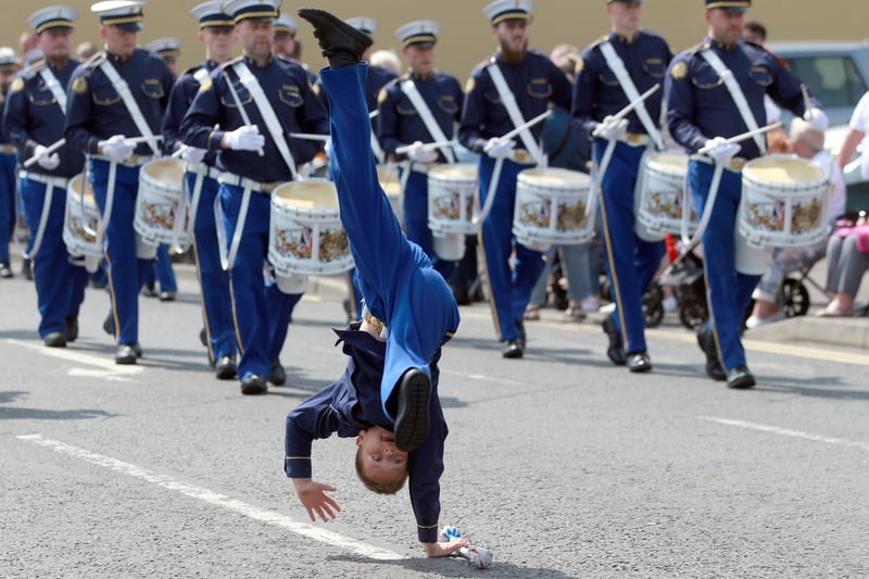 An acrobatic display from the young leader of the Constable Anderson Memorial Band.  Picture: Stephen Davison / Pacemaker.