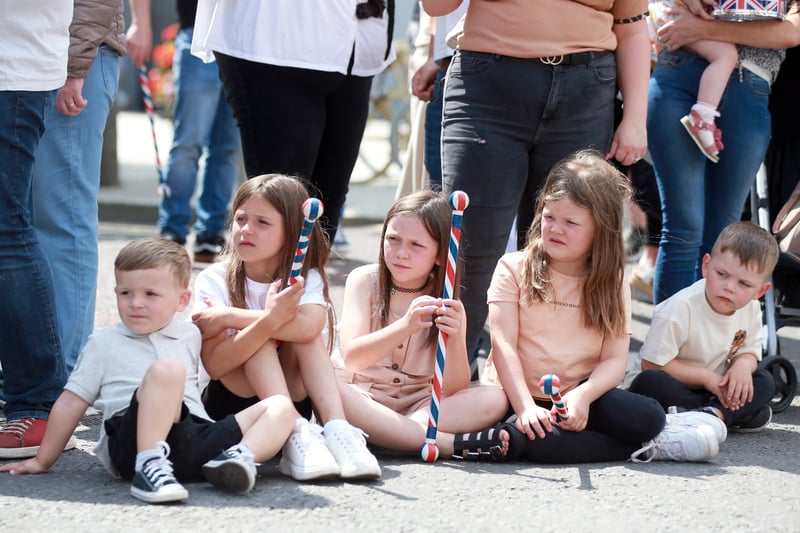 These youngsters are totally focused on the parade during the Twelfth demonstration in Larne. Picture: Stephen Davison / Pacemaker.
