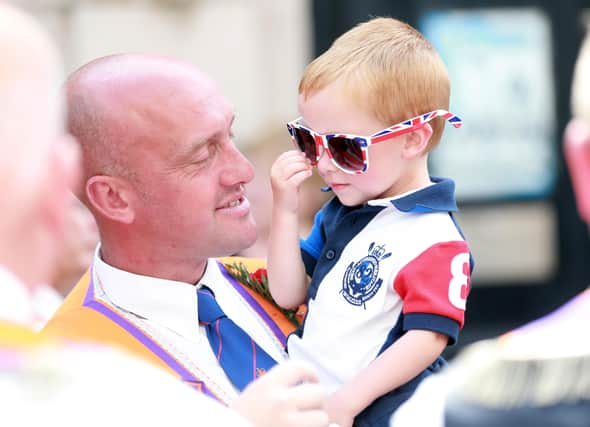 Sunglasses were the order of the day in the fine weather during the Twelfth demonstration in Larne. Picture: Stephen Davison. / Pacemaker.