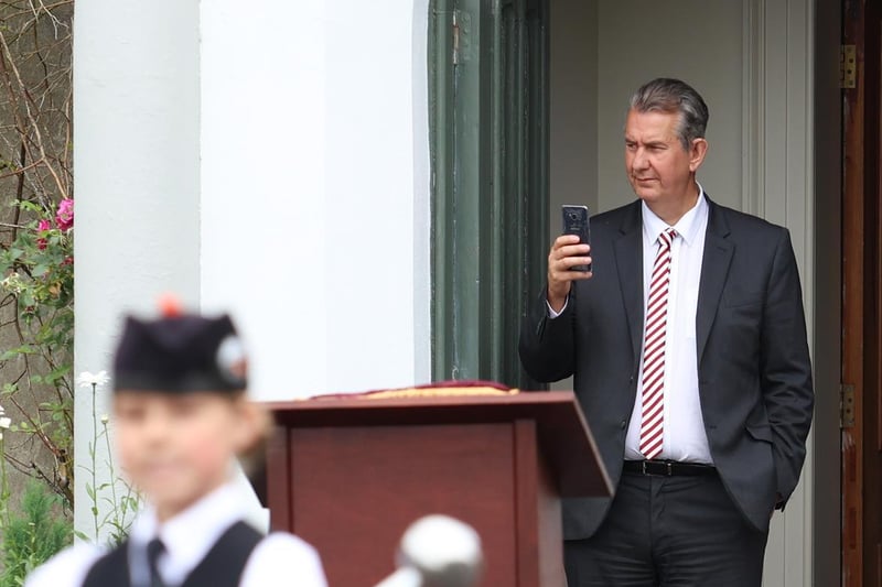 Edwin Poots watches on as Scarva Royal Black Preceptory 1000, and Waringsford Pipe Band walk 'The Thirteenth' alone, as Covid-19 restrictions remain in place.