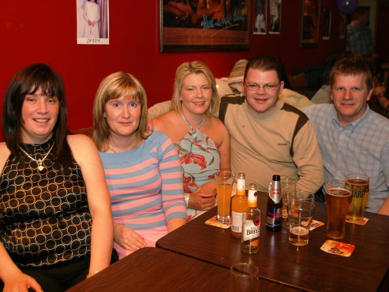Birthday girl Debbie McKane and friends smile for the camera.