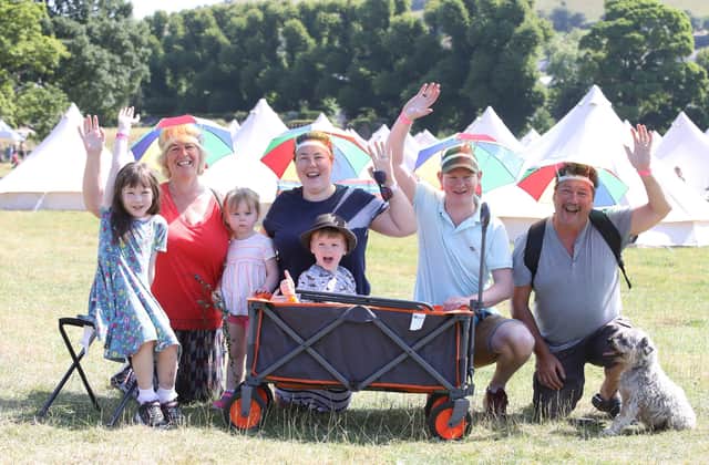 Gary and  Danielle McCracken with their children Freya,(aged eight),Oliver )aged four), and Ameila (aged two) with grandparents Tim and Suzanne Minnis with their dog Ollie,  celebrate the start of Dalfest. Picture: Paul Faith