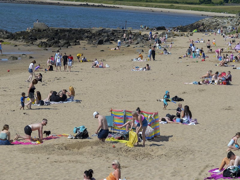 Lady’s Bay on Buncrana’s Shore Front, on Saturday afternoon last. People from Derry flocked to Inishowen’s beaches to enjoy the fine weather. Photo: George Sweeney. DER2128GS – 045