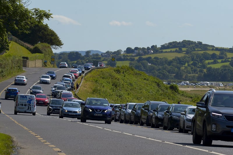 Cars parked along the main road at Lisfannon beach, on Saturday afternoon last, as Derry people flocked to beaches in Inishowen during the mini – heatwave. Photo: George Sweeney. DER2128GS – 046