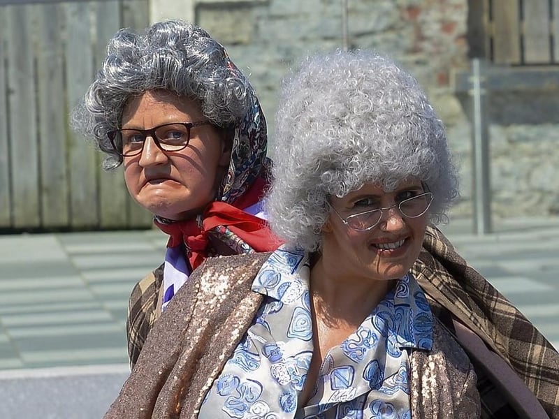 Granny Myrtle and Granny Mavis, from Make – Believe, entertain passers-by, in Ebrington Square, during last weekendâ€TMs mini - heatwave. Photo: George Sweeney. DER2128GS – 053