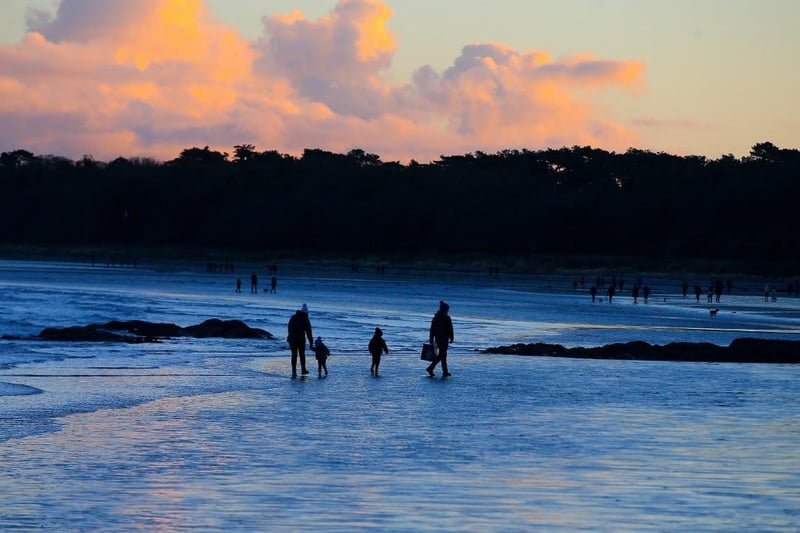 Rockpools and a playground make this beach a very popular destination with families.