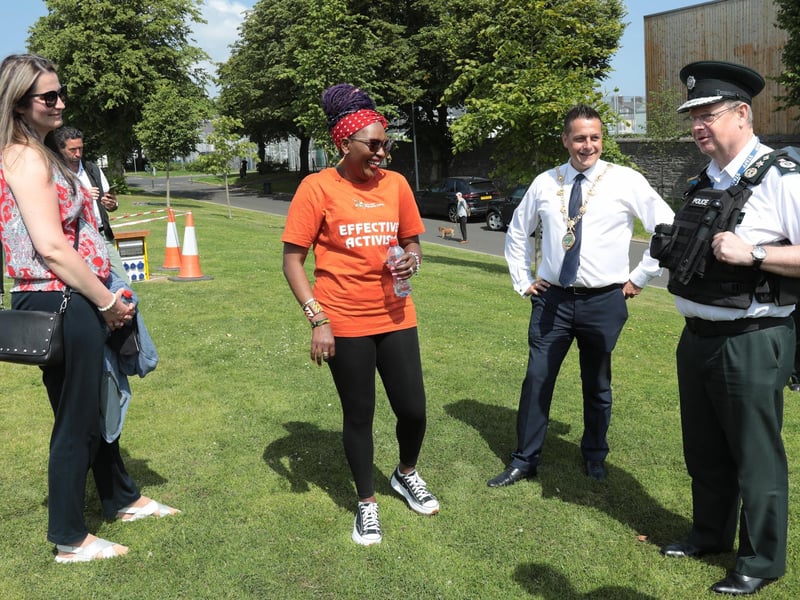 PSNI Chief Constable Simon Byrne is greeted by Mayor Graham Warke, Marija Stuke, chairperson NWMF, Lilian Seenoi-Barr, director, NWMF, on his arrival at the NW Migrants Forum Family Fun Day in Brooke Park. (Photo - Tom Heaney, nwpresspics)