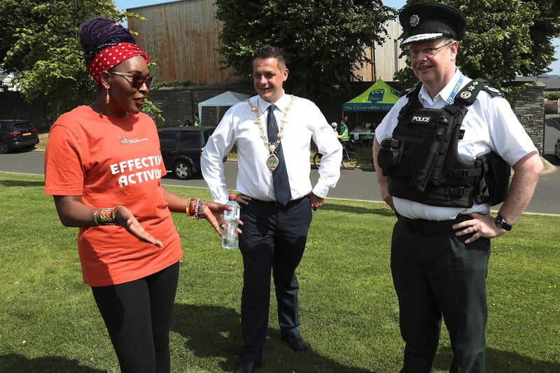 PSNI Chief Constable Simon Byrne chatting to Mayor Graham Warke and Lilian Seenoi-Barr, director, NWMF, on his arrival at the NW Migrants Forum Family Fun Day in Brooke Park. (Photo - Tom Heaney, nwpresspics)