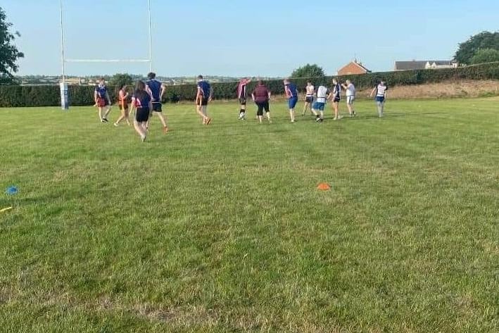 Members from Trillick and District YFC taking part in tag rugby training