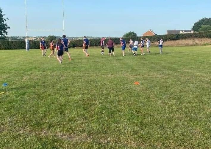 Members from Trillick and District YFC taking part in tag rugby training