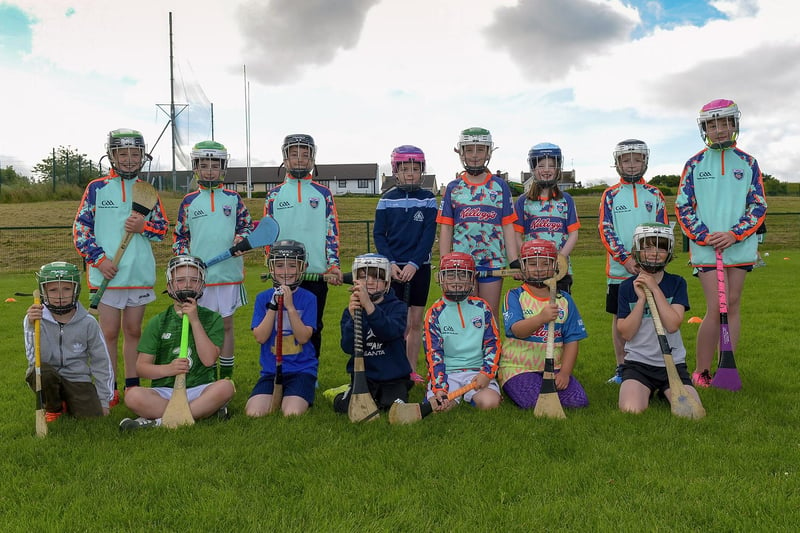 Primary school boys and girls who took part in the recent Cul Camp at Na Magha Hurling Club. DER2128GS - 031