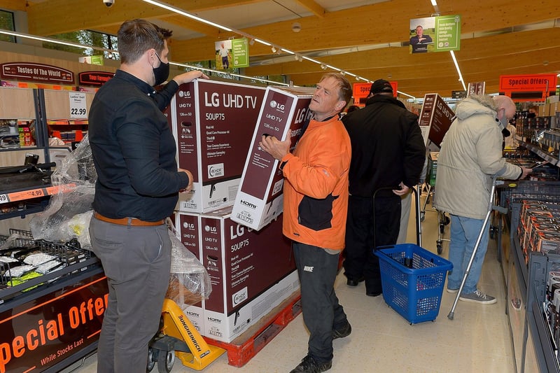 Bargain price televisions at the opening of the new£8m Lidl superstore in Springtown on Thursday morning. Photos: George Sweeney.  DER2130GS - 029