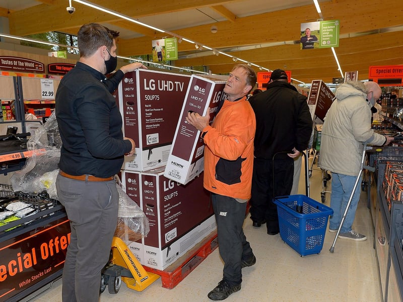 Bargain price televisions at the opening of the new£8m Lidl superstore in Springtown on Thursday morning. Photos: George Sweeney. DER2130GS - 029