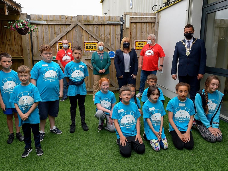 Education Minister Michelle McIlveen MLA pictured with children at Studio 2’s Charlie and The Chocolate Factory theme summer scheme on Wednesday afternoon. Included in the photograph from left are GSACA board members Bobby Kelly and Catrina McFeeley, Ollie Green GSACA Artistic Director and Mayor Alderman Graham Warke. DER2130GS - 021