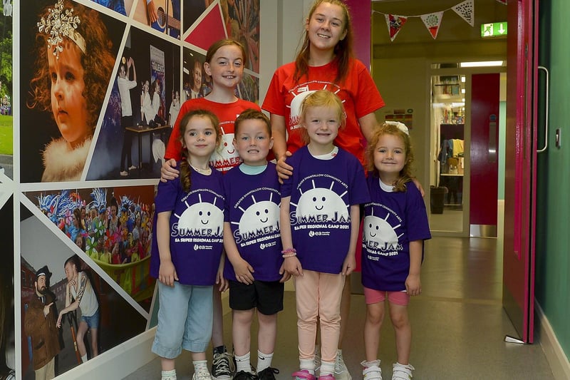 Volunteers Molly and Chloe pictured with Sienna, Cathal, Isla and Maise who attended the Greater Shantallow Arts ‘Trolls’ themed Summer Scheme at Studio 2 recently. DER2128GS - 024