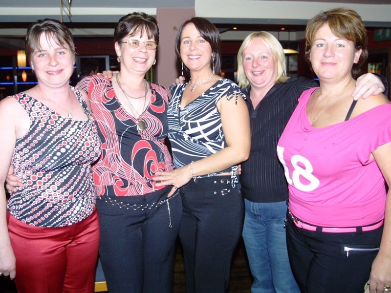 Margaret Boyle and the girls smile for the camera at her birthday party.