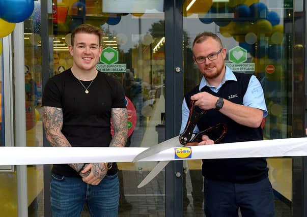 Local personality Eoghan Quigg and Store Manager Niall Harrigan officially open the new£8m Lidl superstore in Springtown on Thursday morning.Photos: George Sweeney. DER2130GS - 022