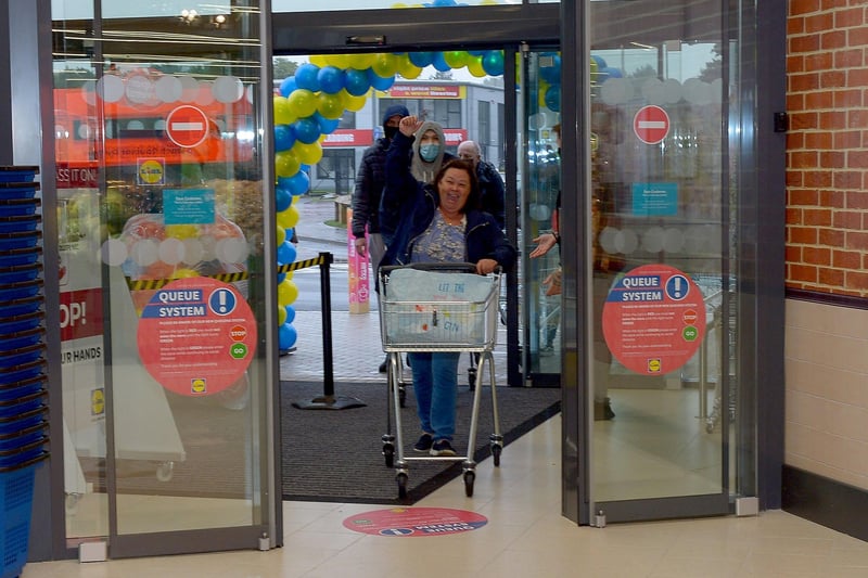 First customer through the door at the opening of the new£8m Lidl superstore in Springtown on Thursday morning. DER2130GS - 024