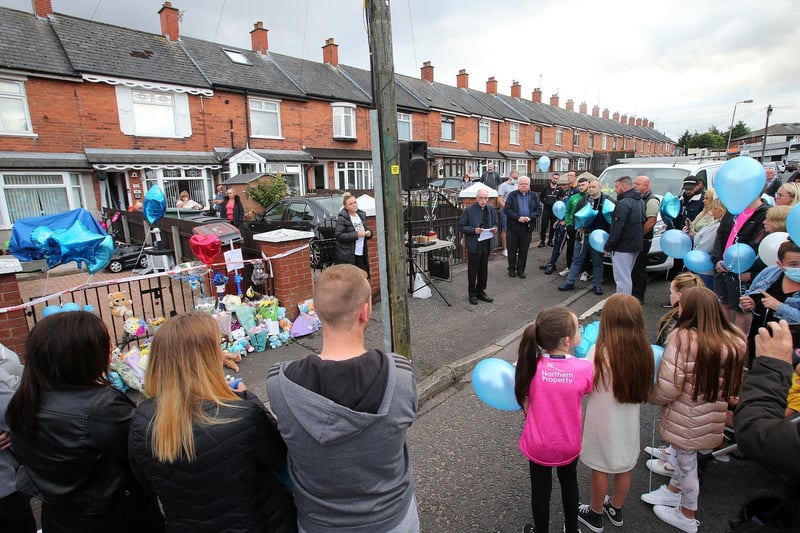 A large crowd gathered outside the house on Thursday evening to pay their respects.