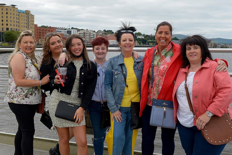 NHS workers pictured on the Peace Bridge on Sunday evening last on their way to the Boyzlife concert in Ebrington Square. Photos: George Sweeney / Derry Journal.  DER2131GS – 026