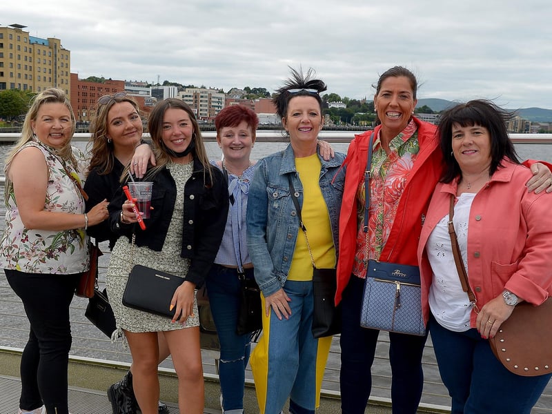 NHS workers pictured on the Peace Bridge on Sunday evening last on their way to the Boyzlife concert in Ebrington Square. Photos: George Sweeney / Derry Journal. DER2131GS – 026