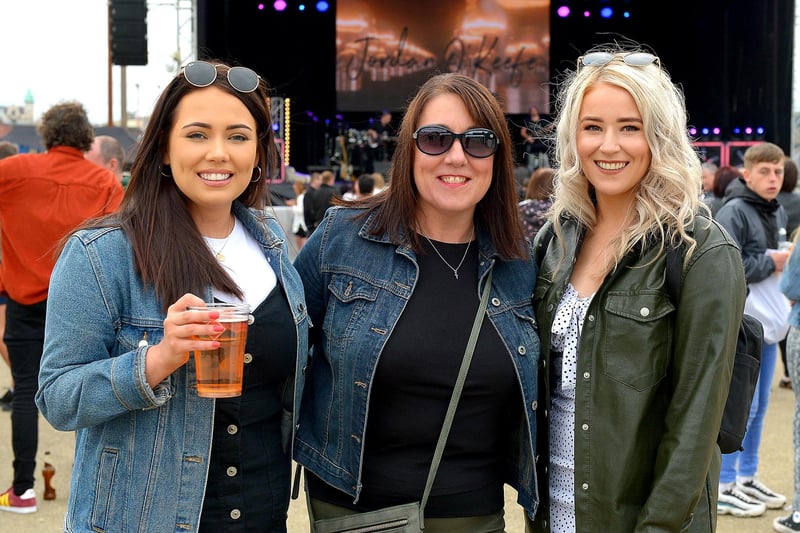 Dungiven girls Michaela, Brenda and Camille pictured at the Boyzlife concert in Ebrington Square on Sunday evening last. Photos: George Sweeney / Derry Journal.  DER2131GS – 025
