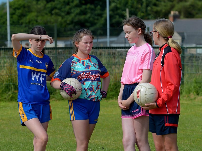 Girls have a break at the recent Brian Ogs Cúl Camp at Páirc Brid. DER2129GS - 051