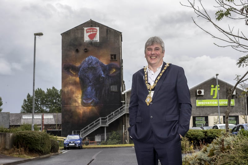 Mayor of Causeway Coast and Glens Borough Council, Councillor Richard Holmes views the new street art on the wall of the Old Mill off Seymour Street Ballymoney