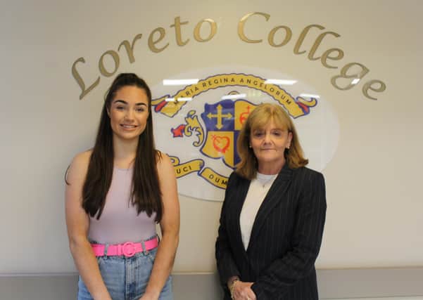 Loreto College student Erin McNicholl, who scored one A*, one Distinction Star and one A in her A levels