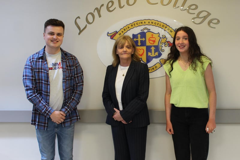 2020-2021 Head Boy, Kelan O’Kane and Head Girl, Orla McEwan, are congratulated by Loreto College Principal Miss Belinda Toner on their outstanding A Level results
