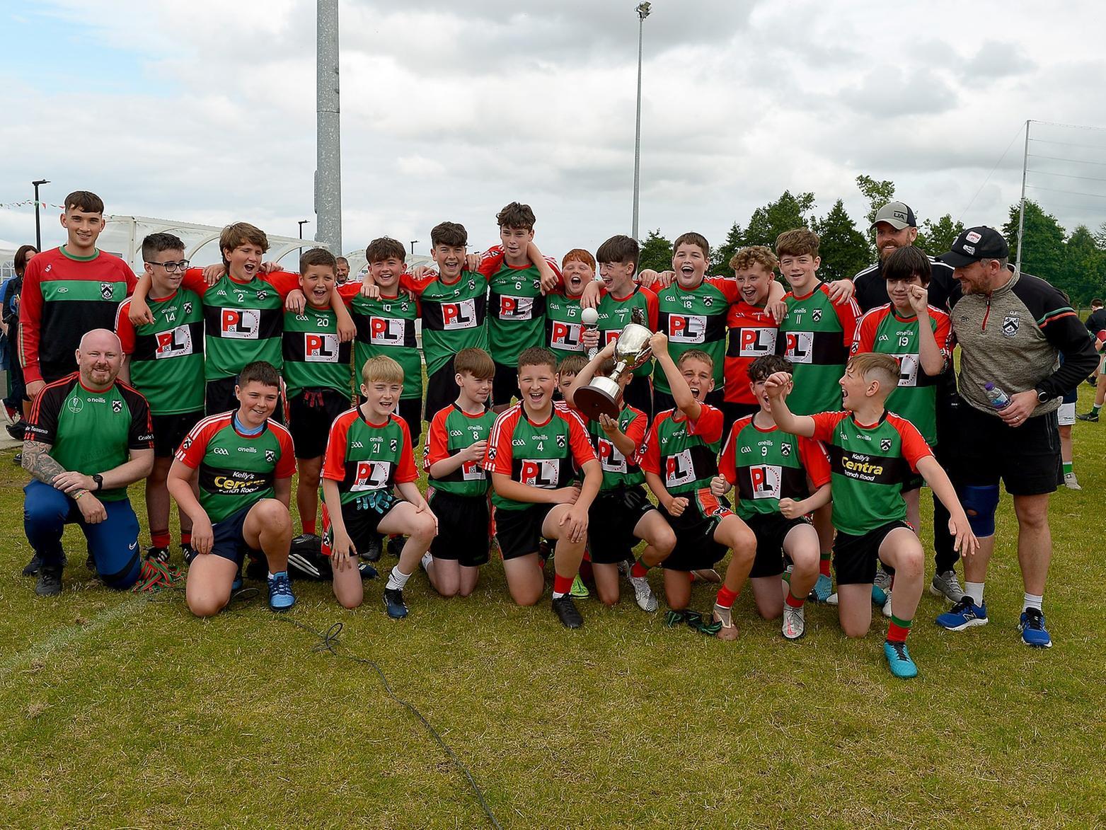 Doire Trasna celebrate their John McChrystal Cup Final defeat of Buncrana on Saturday afternoon last. Photo: George Sweeney. DER2121GS – 103