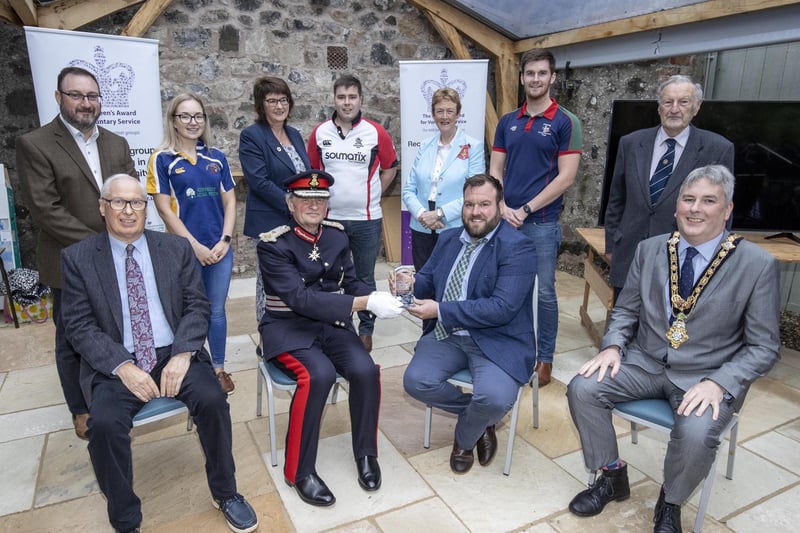 Pictured at a special event to mark the presentation of the Queen's Award for Voluntary Service (QAVS) to North Antrim Agricultural Association are, back row, left to right, Robert Calvin, Rachel Smith, Sandra Adair MBE, James Kirkpatrick, Councillor Joan Baird OBE, Ryan Gamble, Joe Patton CBE. Front row, left to right, James Morrison, Lord Lieutenant for County Antrim Mr David McCorkell, Robert Shannon and the Mayor of Causeway Coast and Glens Borough Council Councillor Richard Holmes.PICTURE STEVEN MCAULEY/MCAULEY MULTIMEDIA