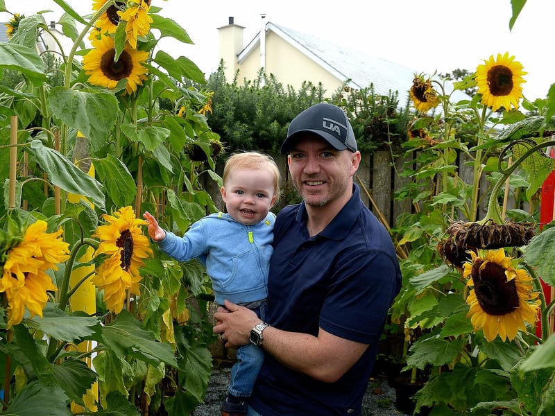 Lachlan Grundy, aged 1, with his dad Sam at the Family HOPE Day held at the Mullan HOPE Centre in Moville, on Sunday afternoon last. Photos: George Sweeney. DER2134GS – 015