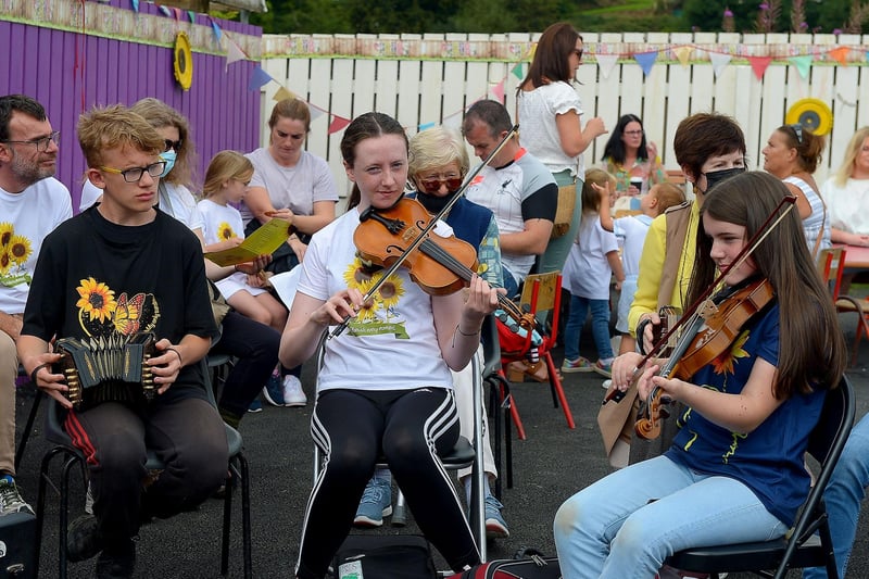 Young traditional musicians play at the Family HOPE Day held at the Mullan HOPE Centre in Moville, on Sunday afternoon last, marking the first anniversary of the passing of John, Tomás and Amelia Mullan. DER2134GS – 012