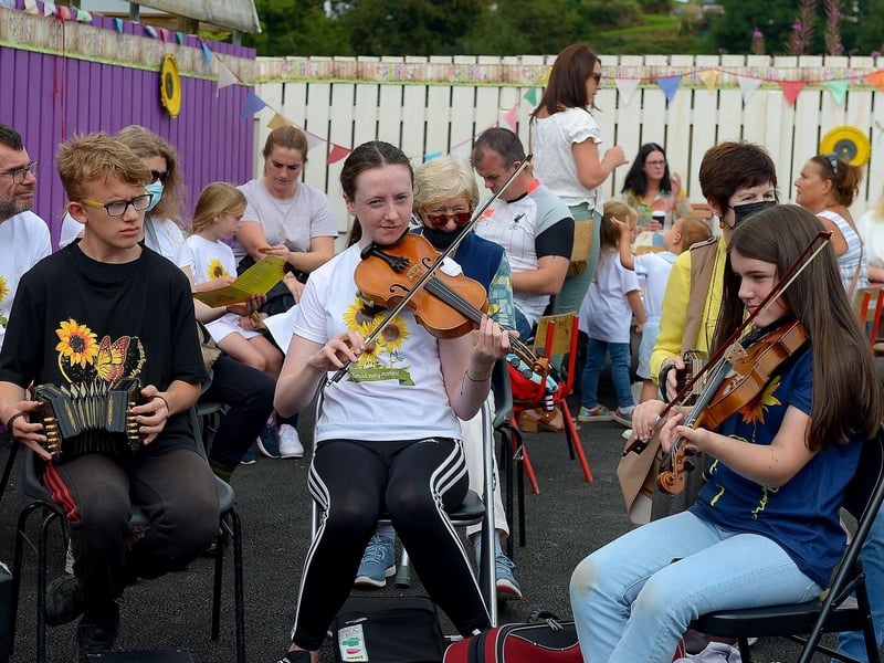 Young traditional musicians play at the Family HOPE Day held at the Mullan HOPE Centre in Moville, on Sunday afternoon last, marking the first anniversary of the passing of John, Tomás and Amelia Mullan. DER2134GS – 012