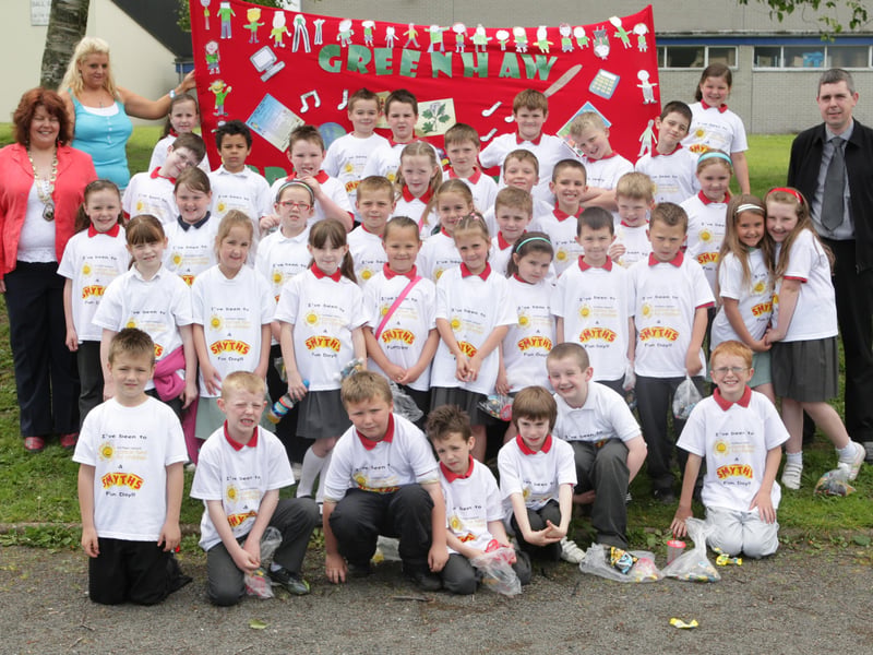 The Deputy Mayor of Derry, Councillor Patricia Logue, with pupils from Greenhaw Primary School who won the Best School, Banner competition in the Northern Ireland Cancer Fund for Children Sponsored Walk and Fun Day held in St. Columb's Park. Included is Michael McNicholl, manager, Smyths Toys. (2705C21)