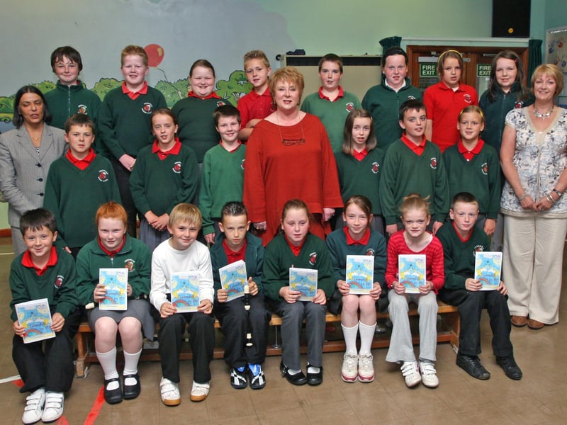 Year 6 pupils at Greenhaw PS launching their anthology entitled 'Learning to Fly', exploring the Myth and Legend of the world of the Imagination, pictured with their facilitator local storyteller Anita Robinson (centre), school principal Vindi Toney (left), and Ruth McKay, vice-principal. LS27-508MT.