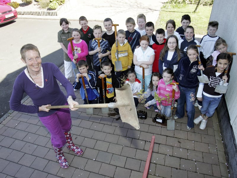 SPADES AT THE READY - Primary five pupils from Greenhaw Primary School, and their teacher Ms. Daisy Mules, who participated in a tree planting at the school as part of the Woodland Trust Tree for All programme. (0905C04)