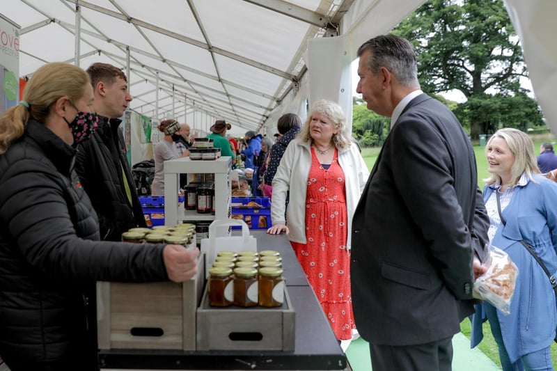 Laura McCorry, Head of Hillsborough Castle welcomes Michele Shirlow of Food NI, and DAERA Minister Edwin Poots MLA, to Hillsborough Castle for the first ever Hillsborough Honey Fair where over 30 local producers and food vendors collaborated with Castle gardeners and foragers to celebrate at things bees and honey. Visitors enjoyed local dishes, demos, storytelling and dancing all on the grounds of the Castle. Picture: Philip Magowan/Press Eye