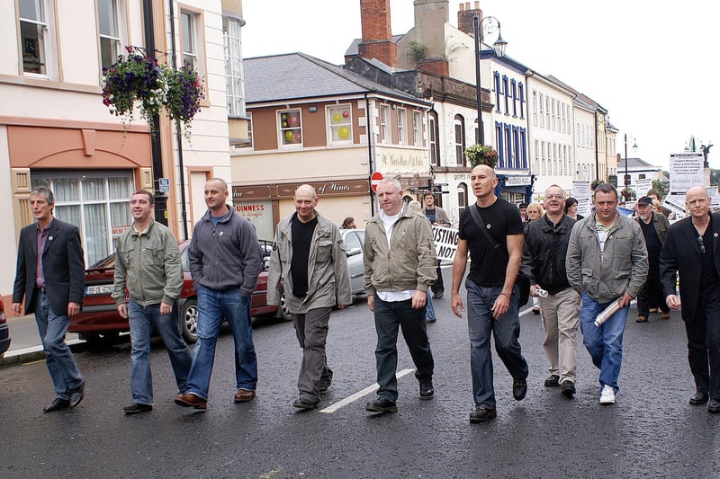The Raytheon 9, Colm Bryce, Gary Donnelly, Kieran Gallagher, Michael Gallagher, Sean Heaton, Jimmy Kelly, Eamonn McCann, Paddy McDaid and Eamonn O’Donnell march to their court appearance in 2006.