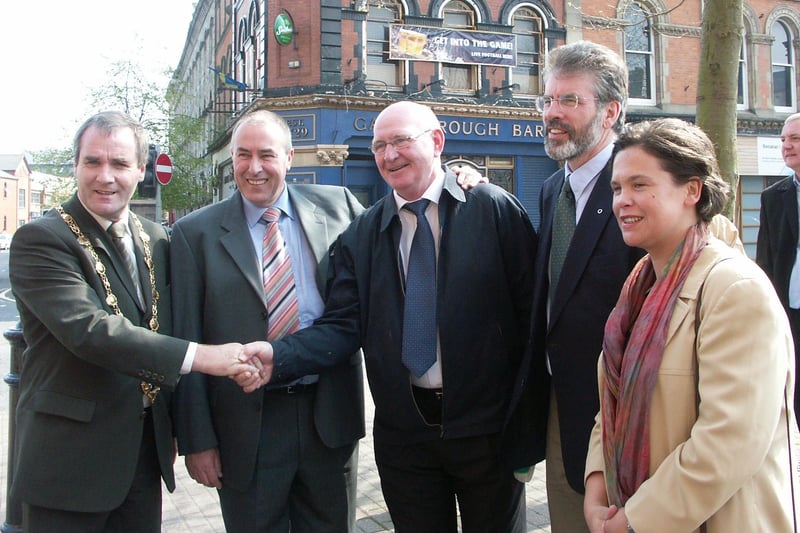 Gerry O'Hara, Mitchel McLaughlin, Johnny Walker, Gerry Adams and Mary Lou McDonald in Derry in 2005.